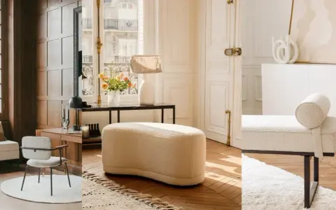 Comode poltrone al posto del divano, in un elegante salotto con parquet e grandi finestre.