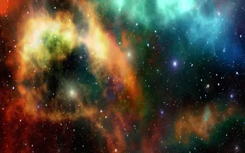 Nebulosa cosmica con sfumature arancioni, verdi e blu. Un universo di stelle che ispira la ricerca e gli sbocchi lavorativi in astrofisica.