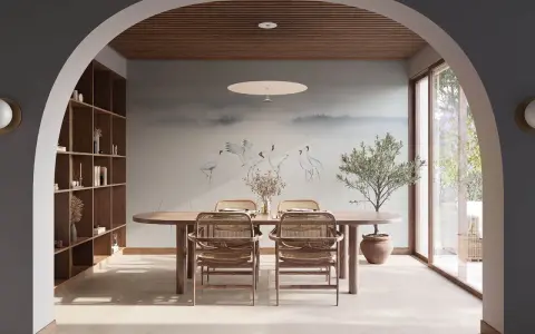 Comedor con mural de grullas y árbol de olivo, creando un ambiente de feng shui sereno y natural.