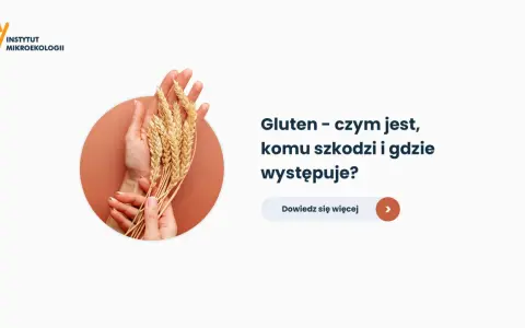 Dłonie trzymające kłosy zboża na tle okręgu.