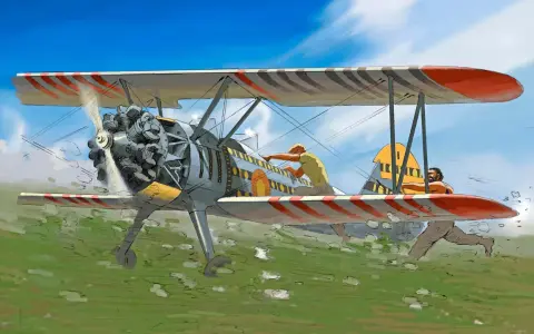 Ein Stearman Flugzeug mit zwei Männern an Bord fliegt über ein grünes Feld. Einer repariert etwas, der andere hält sich fest.