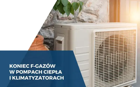 Koniec F-gazów w pompach ciepła i klimatyzatorach. Jednostka zewnętrzna klimatyzatora na tle kamiennej ściany.