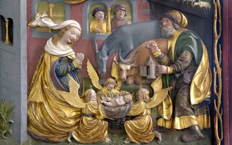 Detailreiche Darstellung der Geburt Jesu zu Weihnachten: Maria, Josef, Engel und Tiere um das Jesuskind.