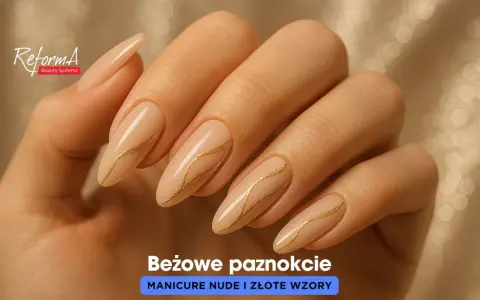 Eleganckie paznokcie nudę ze zlotem, zdobione subtelnymi, złotymi liniami. Idealne na każdą okazję.