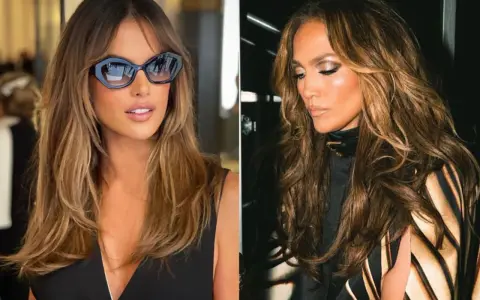 Capelli lunghi e mossi, con riflessi dorati che catturano la **summer light**. Due donne, due stili, un fascino radioso.