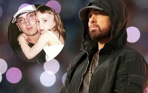 Kto to Eminem? Raper w czarnej bluzie z kapturem i złotym łańcuchem, obok zdjęcie z córką.