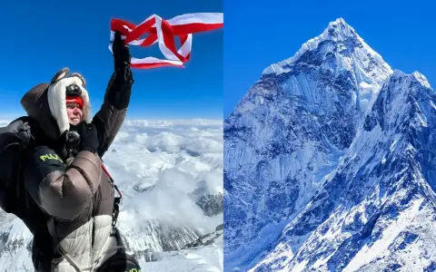 Młoda osoba z flagą na szczycie Mount Everest, najmłodsza osoba na Mount Everest, triumfuje nad chmurami.