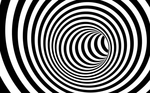 En svartvit tunnel med spiralmönster som kan ge känslan av ångest tankar.