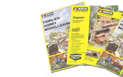 Broschüren für die Faszination Modellbau: Familien Hobby Modellbahn und A Family Hobby Model Railway, mit detaillierten Anlagen und Anleitungen.