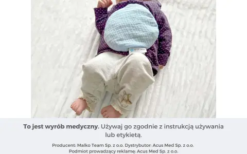 Ciepły termofor z pestek wiśni dla noworodka, delikatnie ogrzewający brzuszek maluszka.