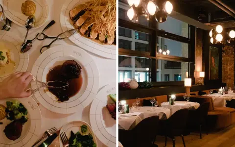 Essen gehen in Berlin: Teller mit Fleisch, Beilagen und eine Hand, die mit einer Zange zugreift. Im Hintergrund ein stilvolles Restaurant mit Tischen und Lichtern.