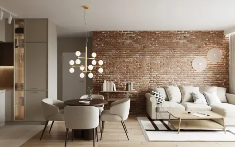Nowoczesny salon z ceglaną ścianą, sofą i jadalnią. Eklektyzm nude w aranżacji.