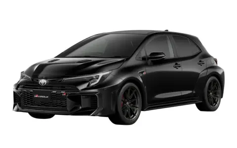 Czarna Toyota Corolla GR z agresywnym grillem i sportowymi felgami, gotowa do podboju dróg.