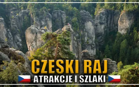 Imponująca, hruba skala w Czeskim Raju, porośnięta drzewami, z widoczną flagą Czech.