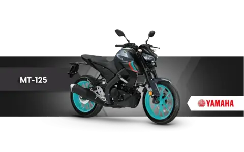 Szary motocykl Yamaha MT-125 z turkusowymi felgami, idealny do kategorii A1.