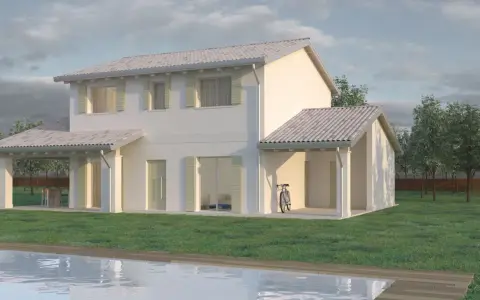 Case a due piani con portico, piscina e giardino. Una bicicletta appoggiata al muro.