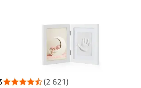 A white diptych frame showing a sleeping baby on a moon and a baby handprint.