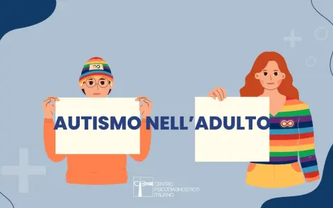 Due persone con cartelli: "AUTISMO NELL'ADULTO". Il centro diagnostico italiano si occupa di chi diagnostica l'autismo negli adulti.