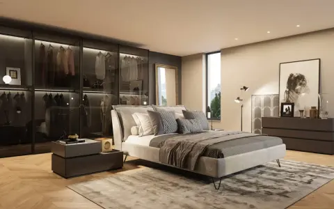 Camera da letto moderna con comò scuro, specchio dorato e un armadio a vista. Ideale per ispirazione su cosa mettere sul comò della camera da letto moderna.