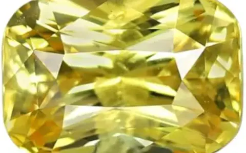 Zaffiro giallo brillante, simbolo di gioia e prosperità. Il suo significato è legato alla saggezza e all'abbondanza.