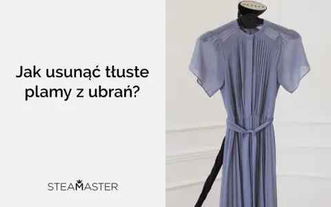 Szare, zwiewne sukienka wieszana na wieszaku, obok tekst: "Jak usunąć tłuste plamy z ubrań?".
