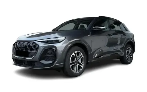 Elegancki, ciemnoszary Audi Q5 2025 z charakterystycznym grillem i nowoczesnymi światłami.