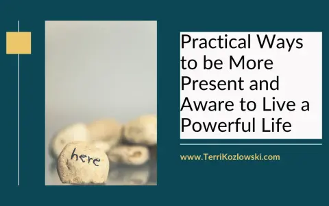 A stone with "here" written on it, symbolizing how to be present and live a powerful life.
