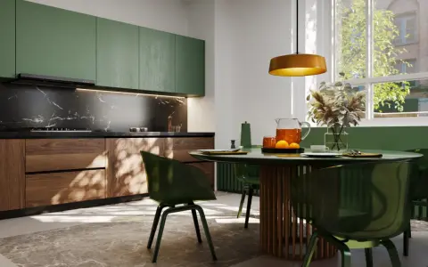 Elegancka kuchnia art deco z zielonymi frontami, drewnianymi detalami i marmurowym blatem. Okrągły stół z zielonymi krzesłami zaprasza do wspólnych posiłków.