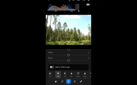 Skogslandskap med en histogramvy som visar SDR och HDR. En knapp för "Edit in HDR mode" är synlig.