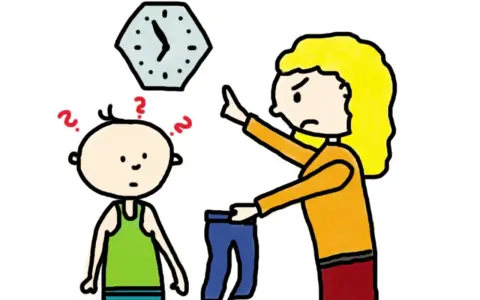 Eine Mutter hält eine Hose hoch und zeigt auf die Uhr. Das Kind ist verwirrt. Konsequent sein ist wichtig.