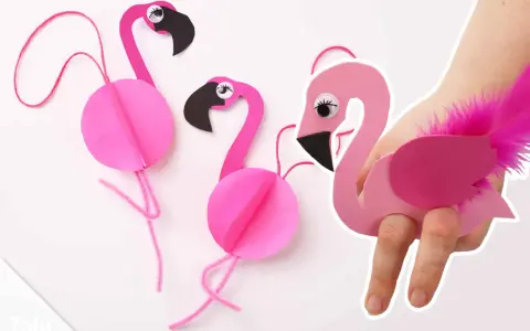 Pink paper flamingos, perfect for flamingo basteln! One is worn on a hand like a puppet, adorned with a fluffy pink feather.