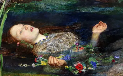 A Pre-Raphaelite masterpiece depicts Ophelia floating serenely in water, her face pale, surrounded by a wreath of flowers.