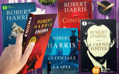 Mani che sfogliano libri di Robert Harris: "Enigma", "L'Ufficiale e la Spia", "Il Ghost Writer" e altri titoli.