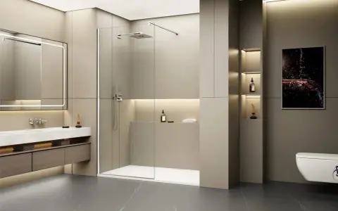 Une douche à l'italienne moderne, spacieuse et épurée, avec une paroi en verre, un pommeau de douche carré et un receveur blanc.