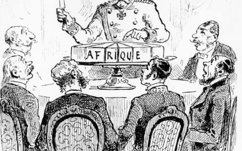 Bismarck teilt Afrika auf. Männer diskutieren die Bismarcksche Kolonialpolitik.