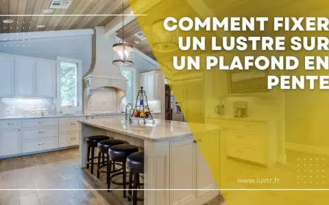 Comment fixer un lustre sur un plafond en pente : une cuisine moderne avec îlot central et luminaires suspendus.