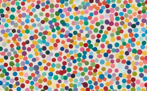 A vibrant canvas filled with colorful dots, a signature of Damien Hirst's "The Currency" series.