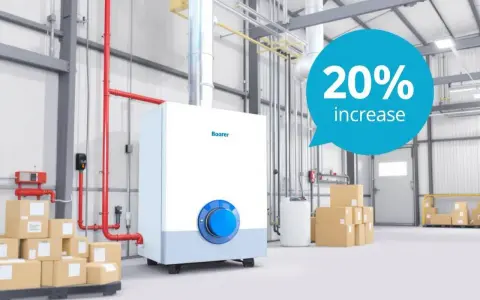 Chaudière gaz Boarer dans un entrepôt. Un message indique "20% increase". Entretien chaudière gaz.