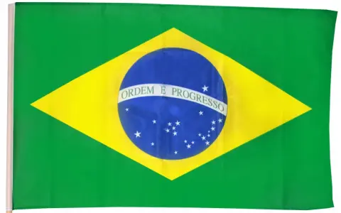 Flaga Brazylii z napisem "Ordem e Progresso" na niebieskiej kuli, symbolizująca marzenia o postępie i rozwoju.