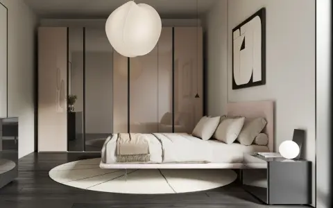 Camera da letto in una casa moderna, con letto rosa, armadio a specchio e lampada a sospensione.