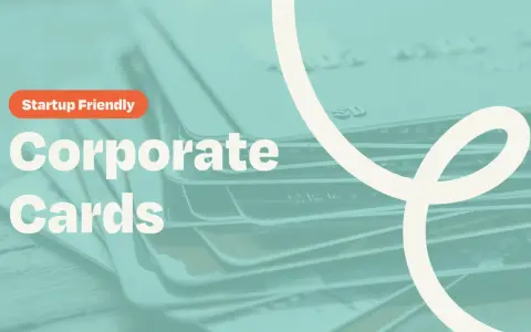 Stack of credit cards with "Startup Friendly Corporate Cards" text. Discover the most reliable corporate credit cards for startups.