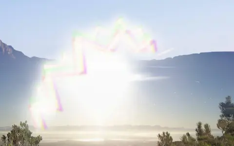 Paesaggio montano con fasci di luce negli occhi, come un arcobaleno zigzagante che attraversa il cielo limpido.