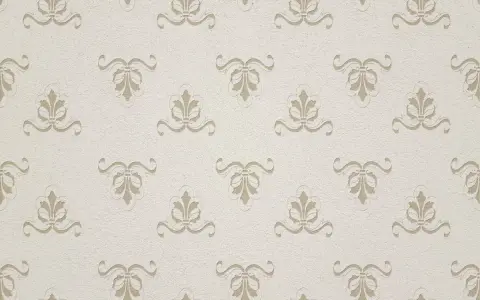 Patrón repetitivo de ornamentos florales en relieve sobre un fondo texturizado. Este papel pintado transpirable aporta elegancia sutil.