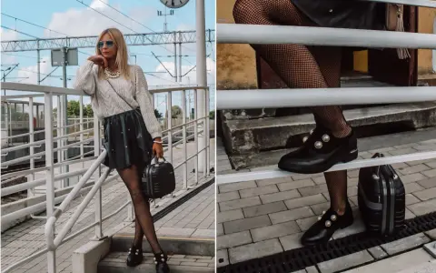 Stylizacja z czarną spódniczką i swetrem. Czy mokasyny pasują do sukienki? Tak, te ozdobione perłami świetnie uzupełniają look.