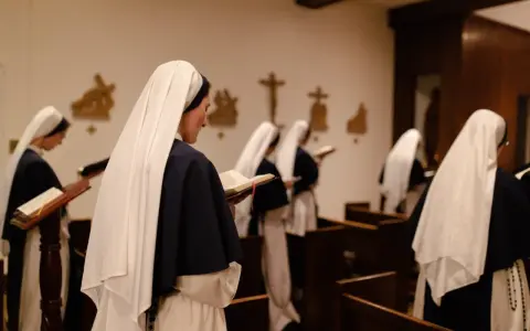 Nuns in a chapel reading from books. This scene offers a glimpse into how to join a monastery female, showcasing devotion and study.