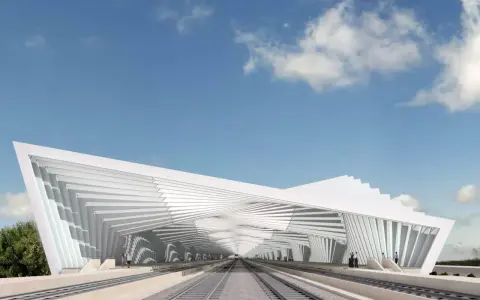 Stazione Reggio Emilia, un capolavoro dell'architetto con un tetto bianco a spirale che copre i binari.