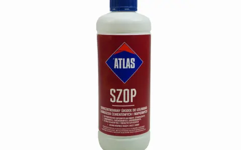 Butelka środka czyszczącego Atlas Szop. Skoncentrowany preparat do usuwania zabrudzeń cementowych i wapiennych.