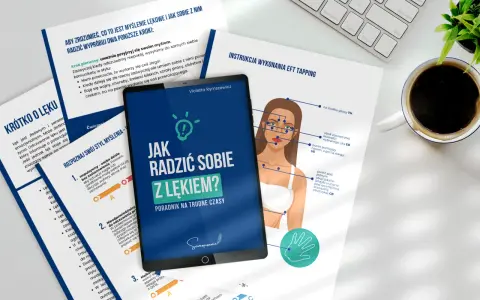 Tablet z grafiką instrukcji EFT Tapping i dokumenty dotyczące lęków.