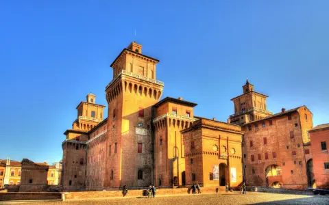 Castello Estense in Ferrara, a stunning brick fortress, is one of the best day trips from Bologna.