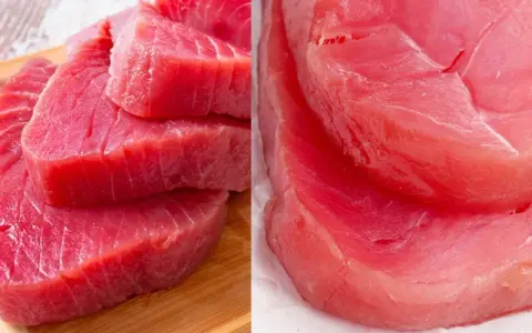 Fette di tonno pinna gialla mediterraneo, fresche e succulente, pronte per essere gustate.